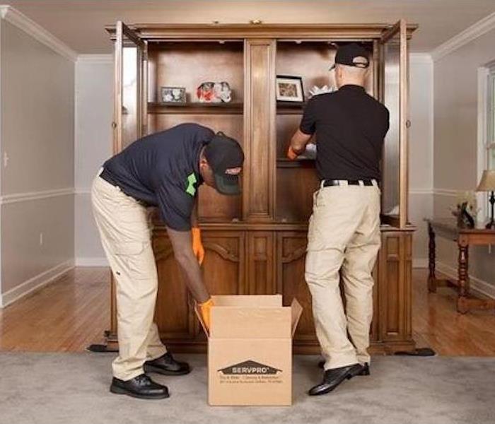 SERVPRO technicians carefully packing out a home